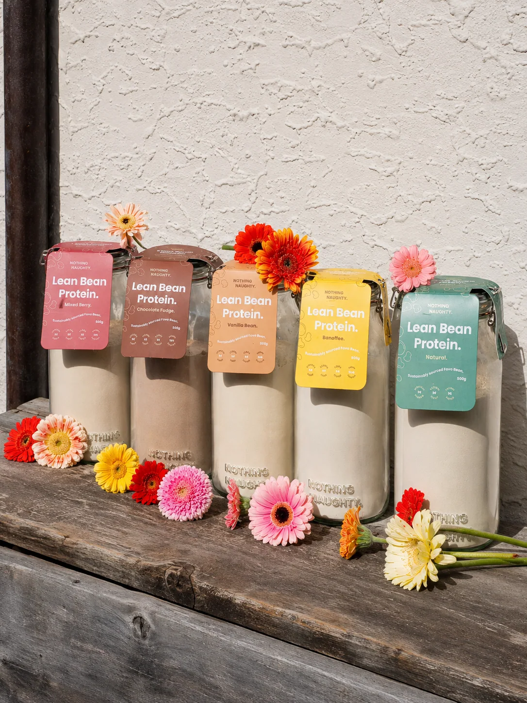 Plant-based protein products displayed with flowers